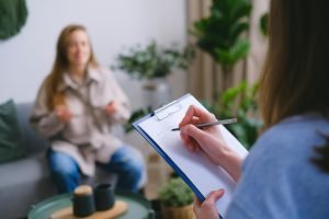 A therapist reviewing DSM-5 diagnostic criteria for depression.