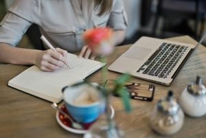 A person journaling or practicing mindfulness as part of depression recovery strategies.